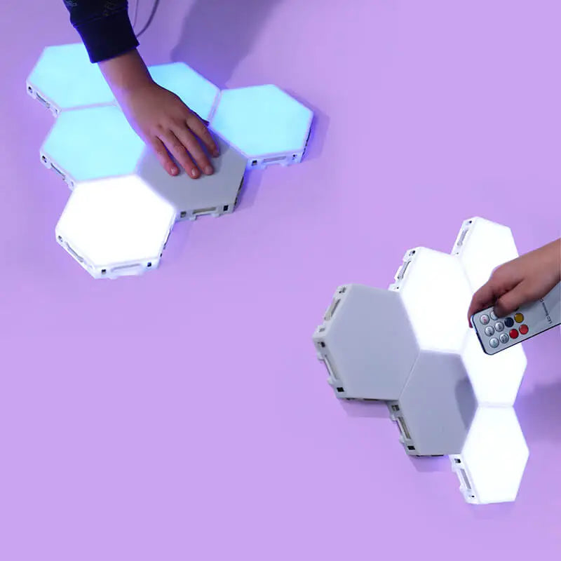 Hands adjusting Lumagic LED lights