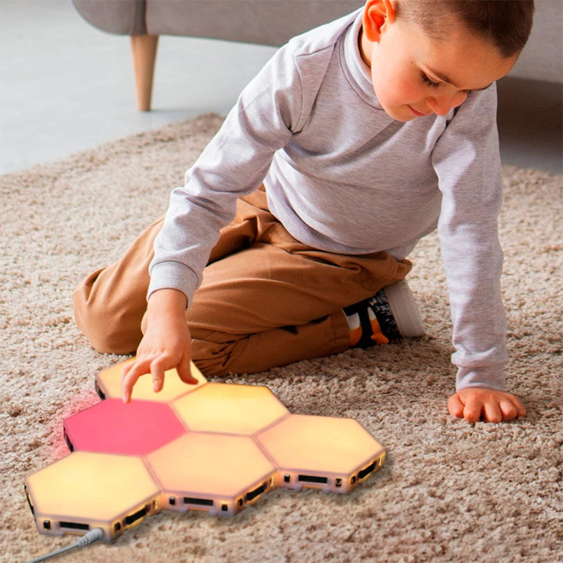 Boy touching Lumagic LED panels